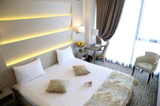 Отель Golden Tulip Victoria Bucharest Бухарест Стандартный номер с кроватью размера "king-size"-4